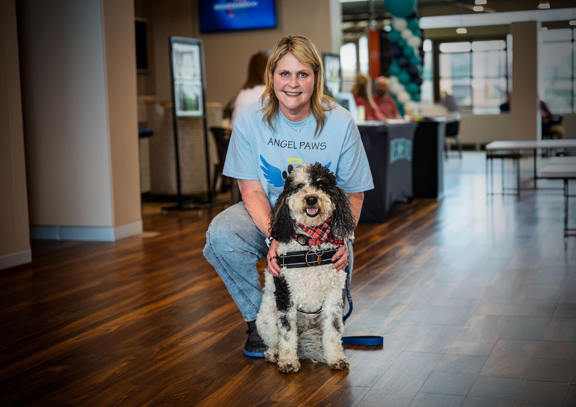 Angel Paws therapy dog with handler, ready for visits